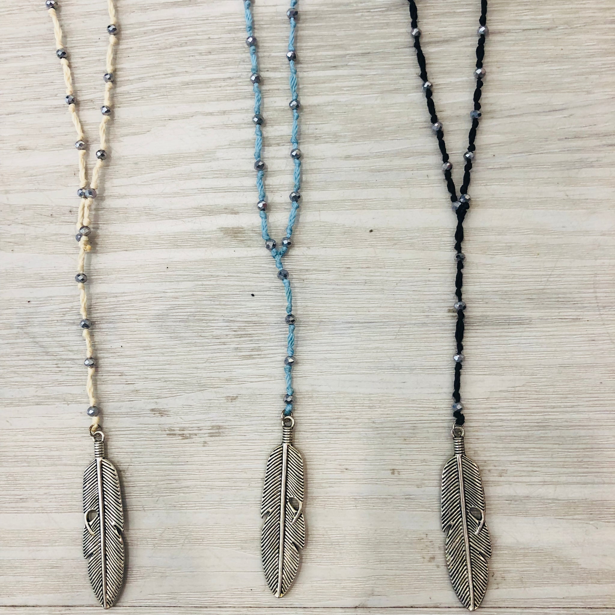 TM. Silver Feather Necklace