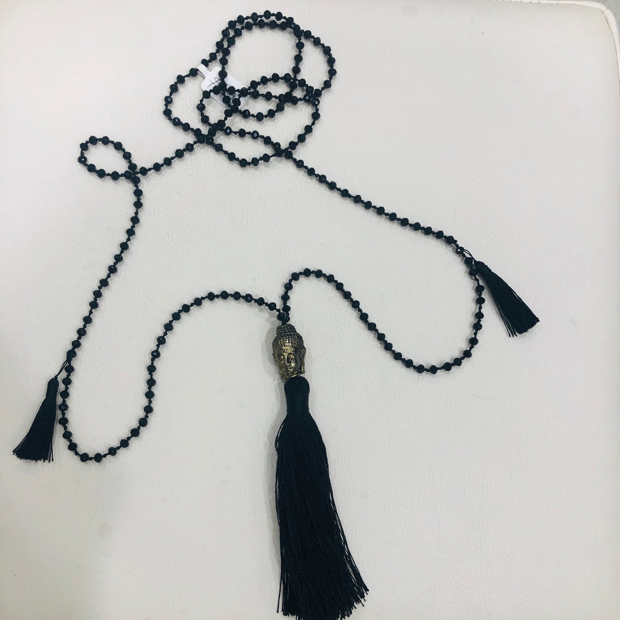TM. Black Bead Buddha Tassel Necklace