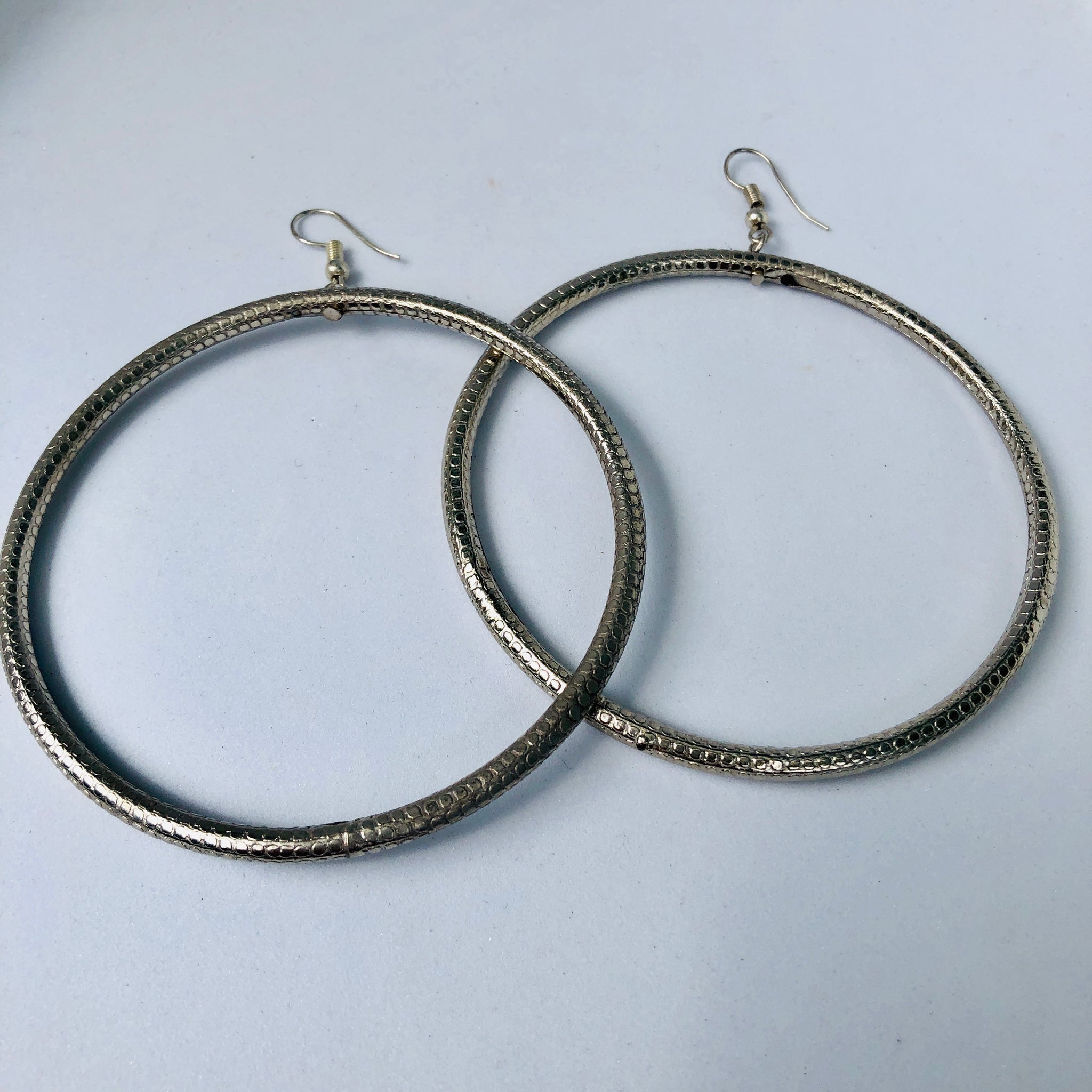 TM. Etched Silver Hoop Earrings