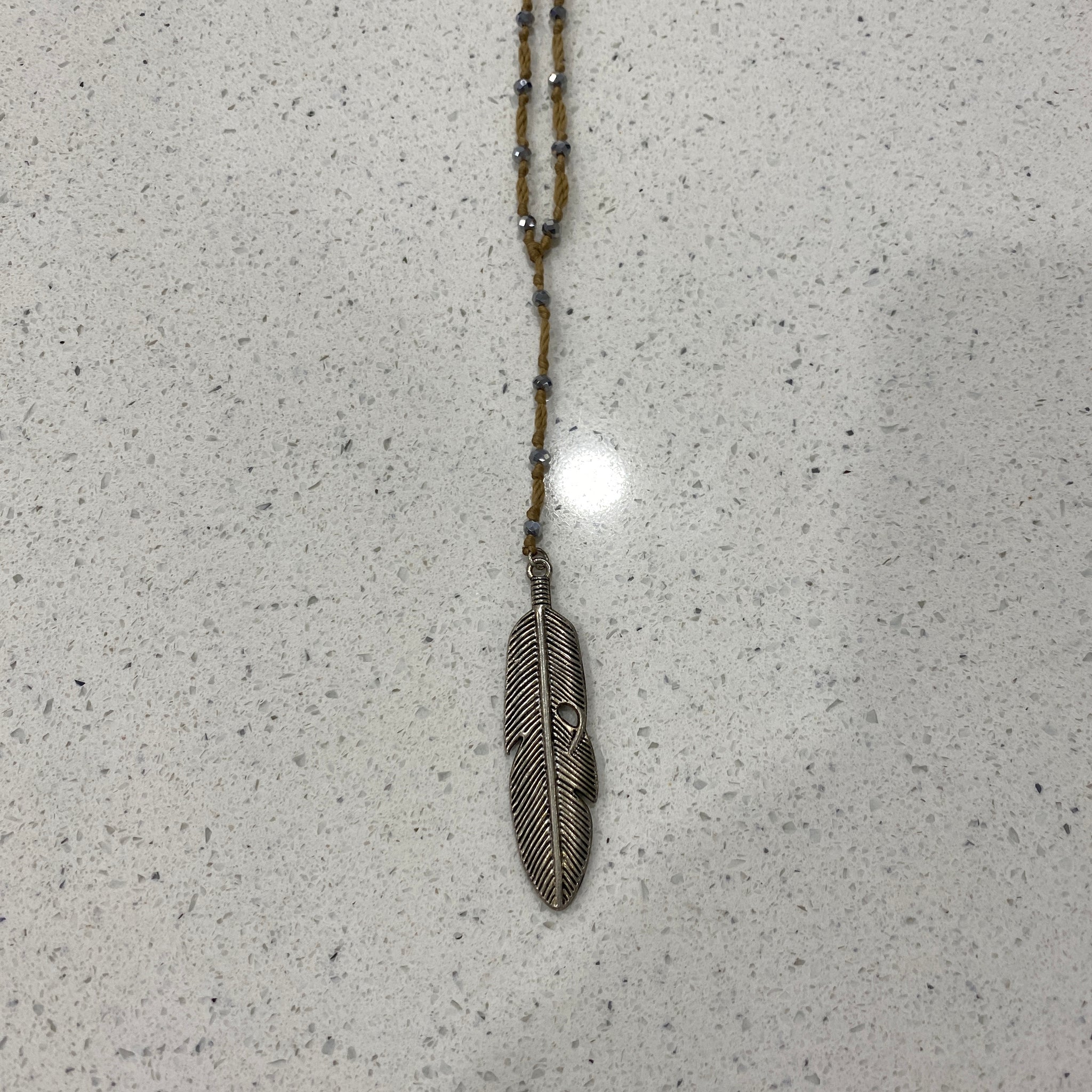 TM. Silver Feather Necklace